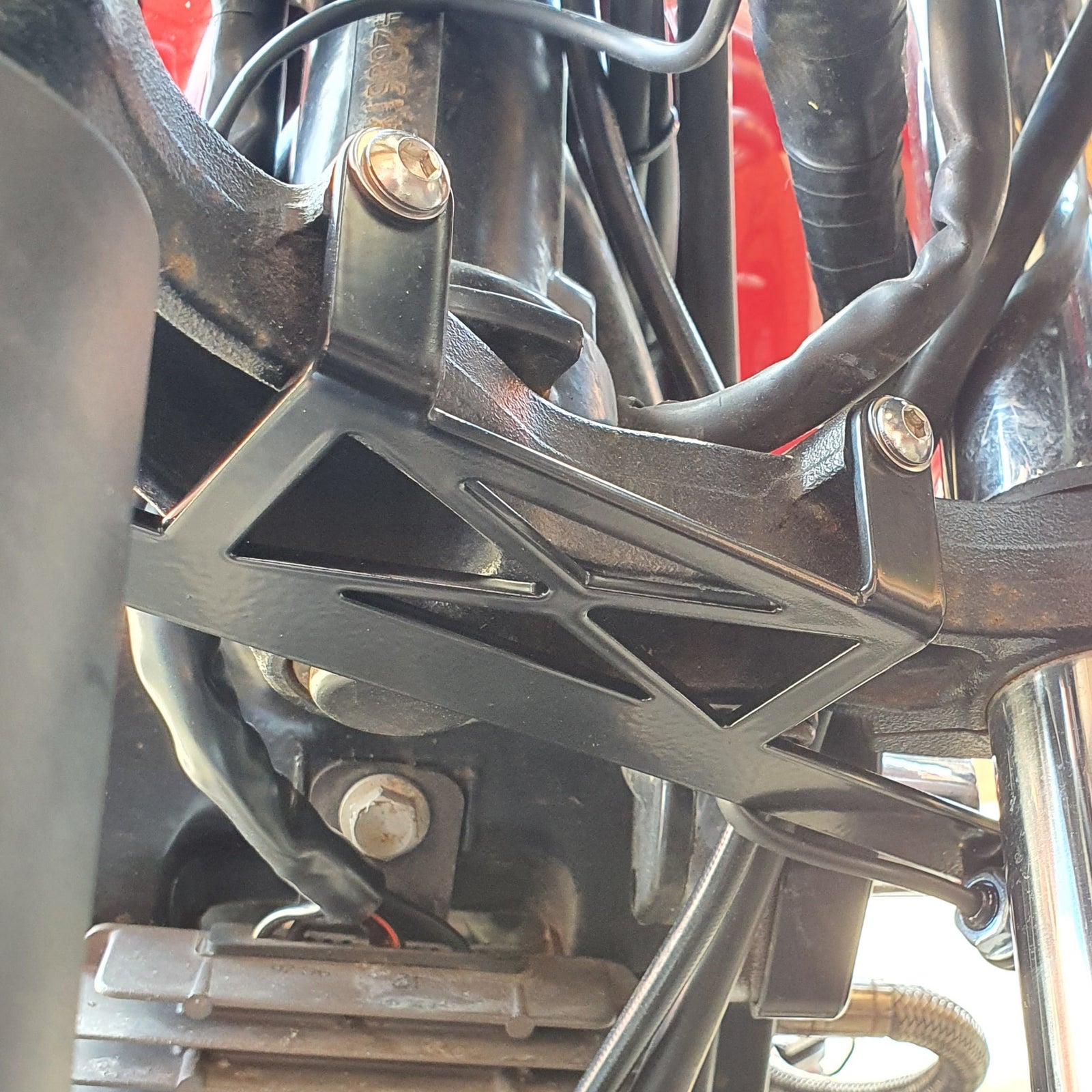 Triumph front indicators relocation bracket