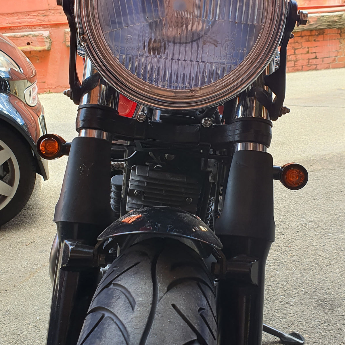 Triumph front indicators relocation bracket