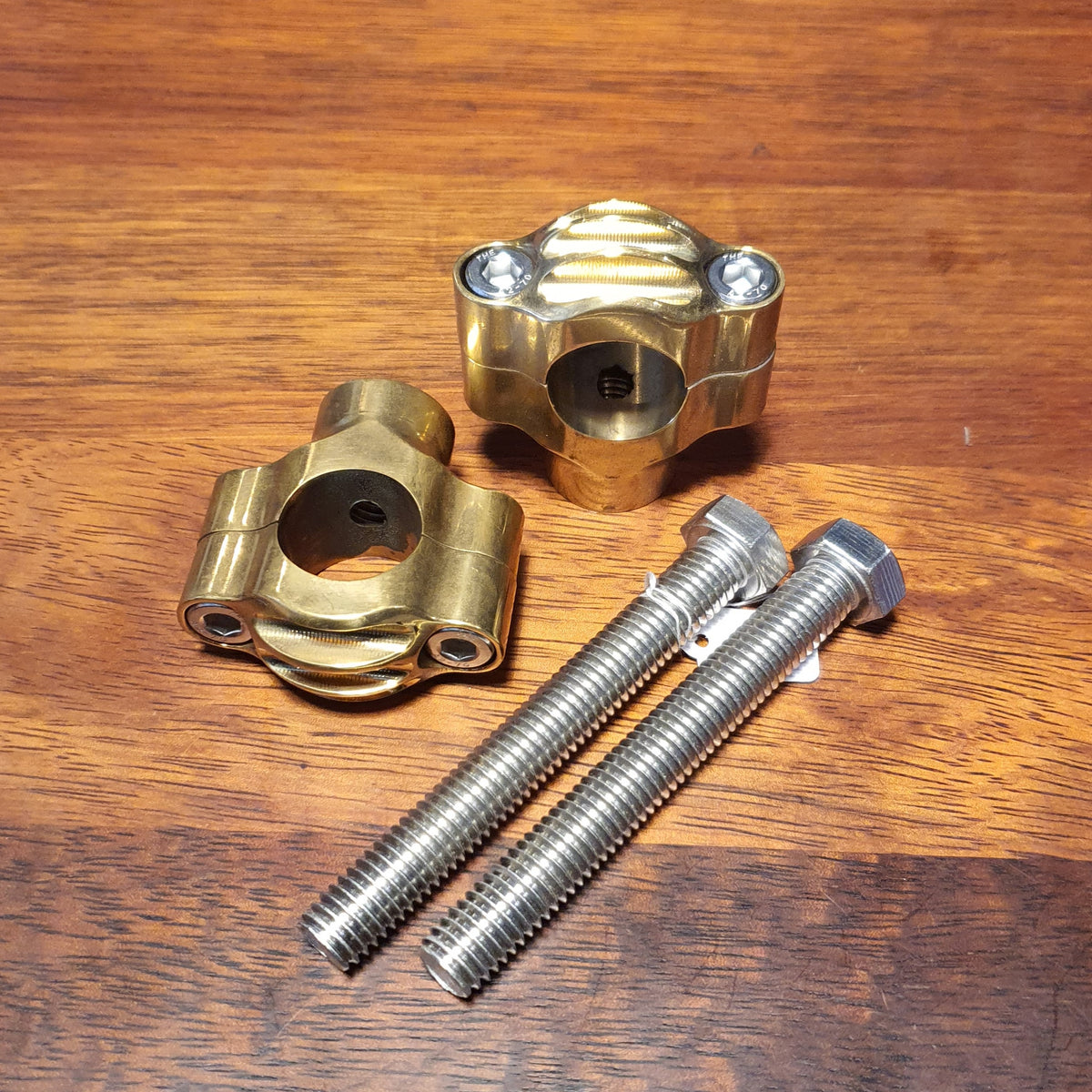 Solid brass risers for 1" bars
