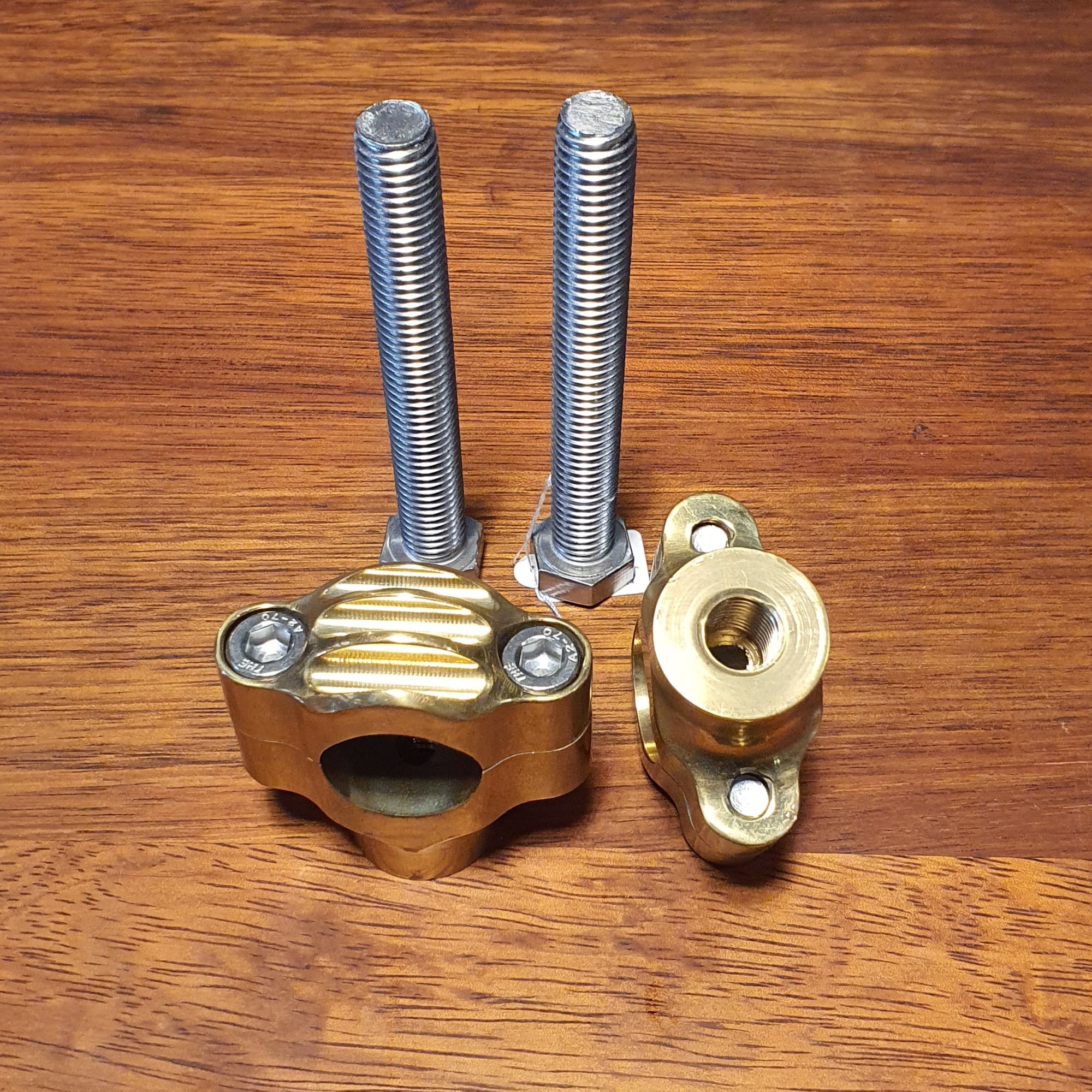 Solid brass risers for 1" bars