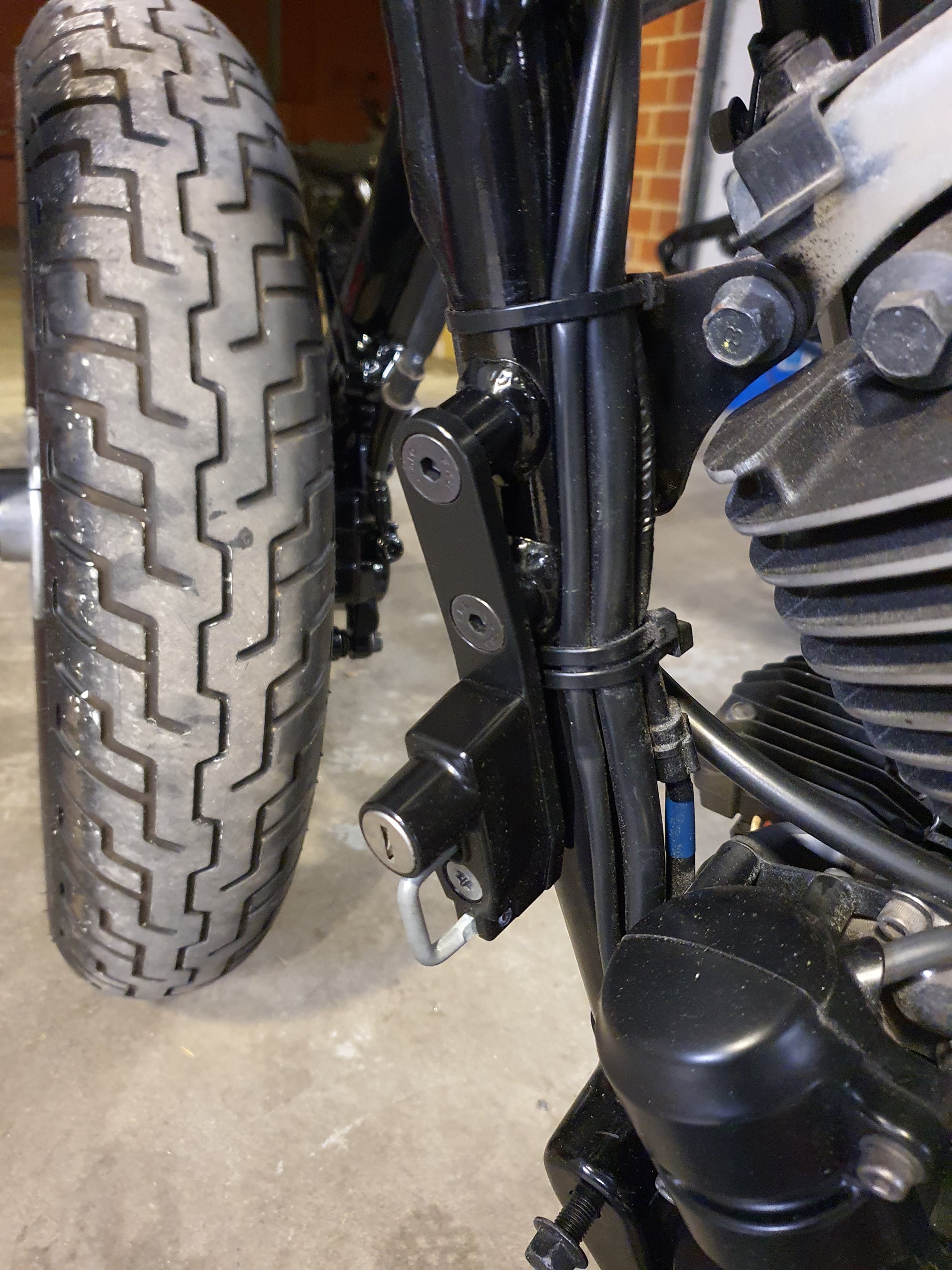 XVS650 v-star helmet lock relocation bracket rogue motorcycles perth